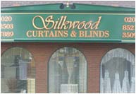 Traditional timber sign with mouldings and wooden letters bevelled and guilded