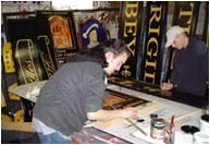 Traditional signwriting in the signwriting department